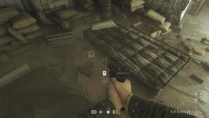 Лежащая около матрасов карточка звезды №12 «Ник Корт», Wolfenstein II: The New Colossus