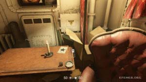 Лежащая на столе карточка звезды №5 «Питер Галли», Wolfenstein II