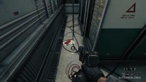 Фрагмент кода машины «Энигма» 2:9, лежащий на полу, Wolfenstein: The New Order