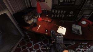Фрагмент кода машины «Энигма» 6:1, лежащий на столе, Wolfenstein: The New Order